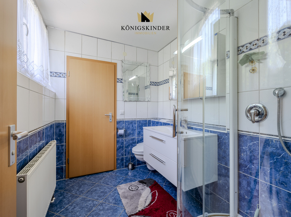 Frische und Komfort – modernes Bad mit Dusche