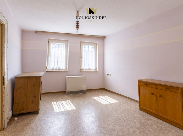 Schlafzimmer- Rückzugsort mit Ruhe – großzügiges Schlafzimmer mit Blick ins Grüne