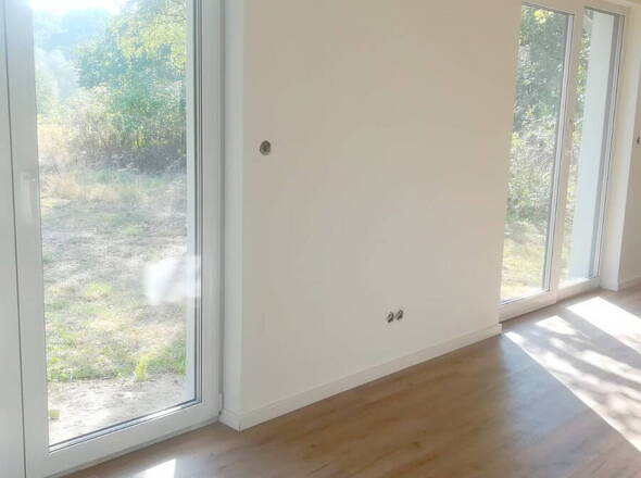 Bodentiefe Fensterelemente in offen gestaltetem EG